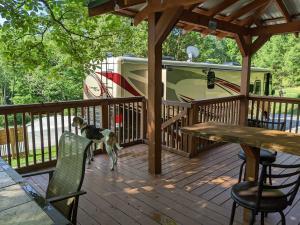 Site #7 at Deer Springs RV Park. Very private, pull through site. Lots of shade! Private gazebo, refrigerator, ice maker, picnic table and firepit.