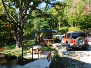 Big Rig Friendly! Cement parking pad, gazebo with refrigerator and ice maker. Pet containment area with picnic table and fire pit.