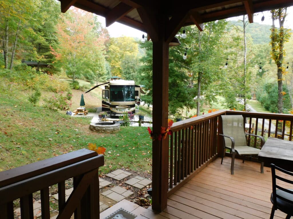 Big Rig Friendly! Private, secluded site with concrete parking pad. Gazebo, refrigerator with ice maker, picnic table, fire pit, and nice views.